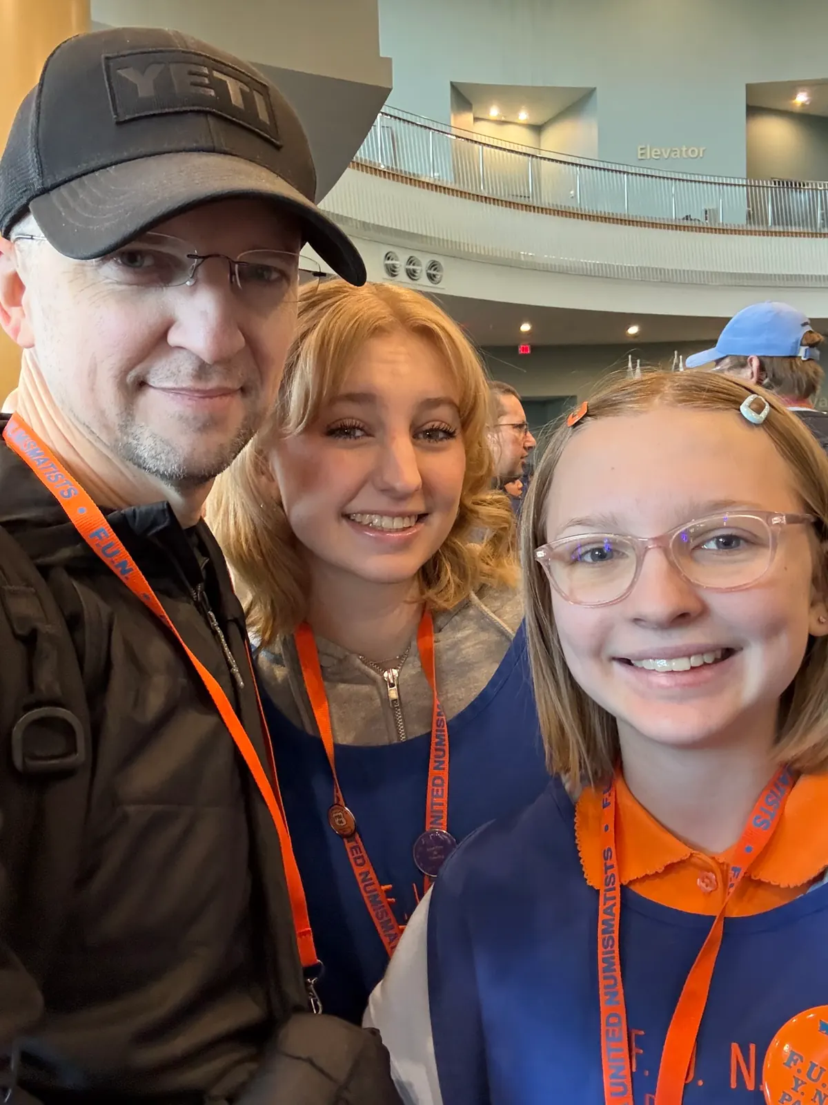 Stephen Gill, Madeline Gill, and Haley Gill at the summer F.U.N. coin show in Florida